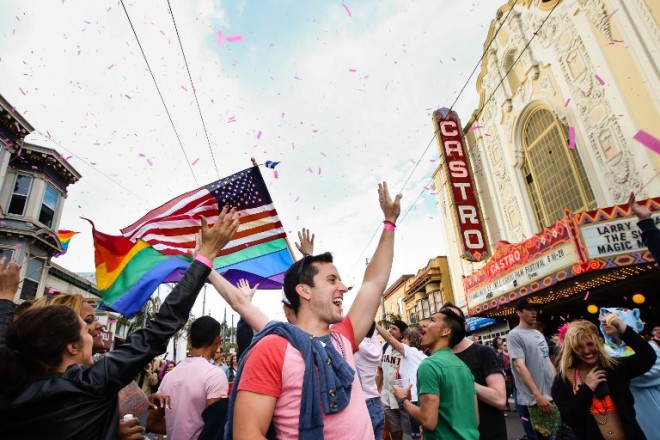 People cheer as pink confetti falls from the sky during a gay pride celebration on June 27, 2015 in San Francisco, California. The Supreme Court ruled that same-sex couples have a constitutional right to marry nationwide without regard to their state's laws.   Elijah Nouvelage/Getty Images/AFP