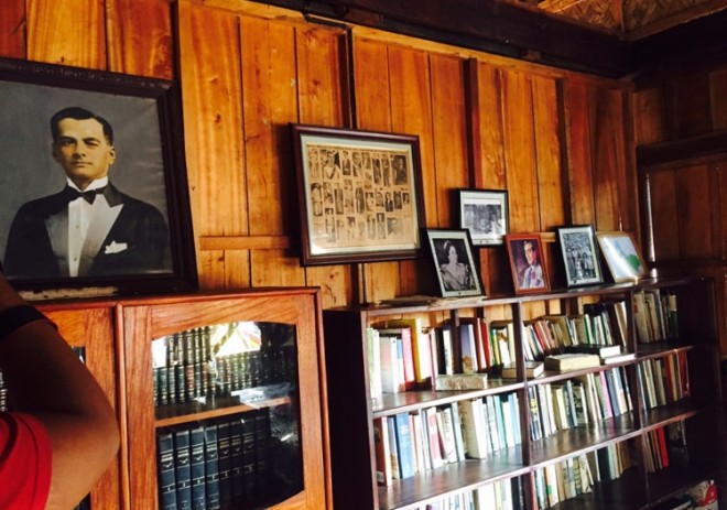 Aurora Quezon's house contains old books and portraits of the couple.