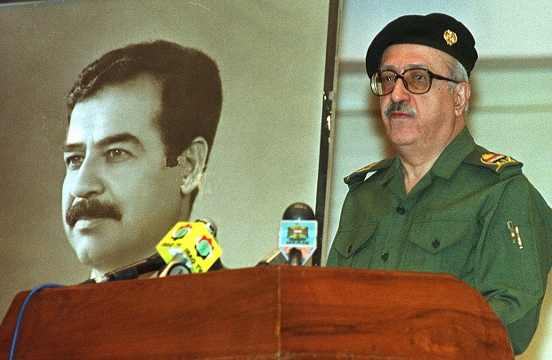 FILE - In this, Saturday, April 15, 2000, file photo, Iraq's Deputy Prime Minister Tariq Aziz addresses journalists in Baghdad, where he said Iraq does not accept a new U.N. Security Council plan to resume weapons inspections in the country. Tariq Aziz, the debonair Iraqi diplomat who made his name by staunchly defending Saddam Hussein to the world during three wars and was later sentenced to death as part of the regime that killed hundreds of thousands of its own people, has died in a hospital in southern Iraq. He was 79.  (AP Photo/Jassim Mohammed, File)
