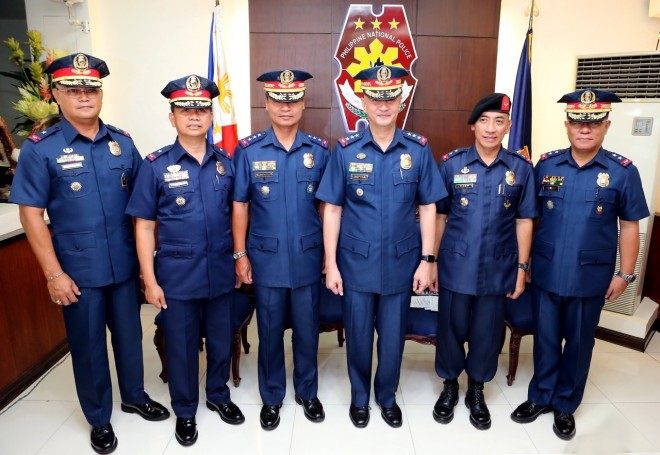 PNP OIC Deputy Dir. Gen. Leonardo Espina administered on Thursday the oath-taking of Deputy Dir. Gen. Danilo Constantino and three other officers. Photo courtesy of PNP PIO