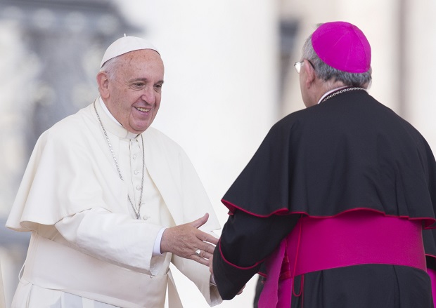 Pope Francis greets Philadelphia's Archbishop Charles Joseph Chaput at the end of his weekly general audience, in St. Peter's Square, at the Vatican, Wednesday, June 24, 2015. Pope Francis will be traveling to Philadelphia next September to attend a World Meeting of Families. (AP Photo/Riccardo De Luca)