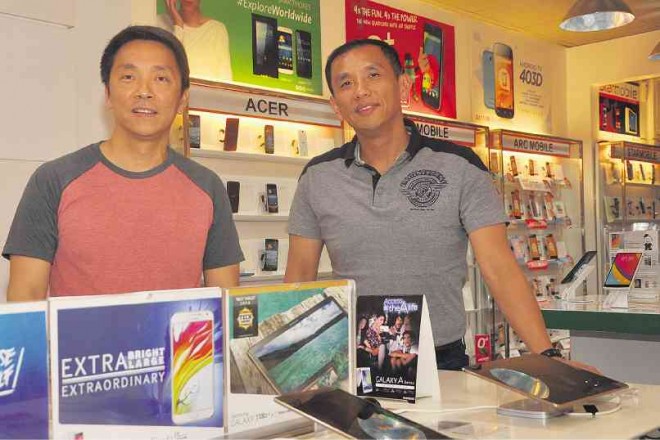 THE LO BROTHERS, Guanson (left) and Joseph, run the Guanzon Group of Companies, a Dagupan City-based family enterprise that has expanded into 140 branches around the country. 