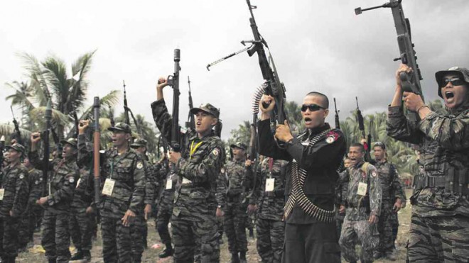 FAREWELL TO (SOME) ARMS  To show its sincerity in pursuing peace in Mindanao, the Moro Islamic Liberation Front is turning over 75 high-powered weapons and decommissioning 145 fighters on Tuesday.  DENNIS JAY SANTOS/INQUIRER MINDANAO