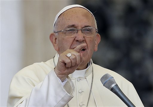 Pope Francis delivers his message on the occasion of an audience with participants of Rome's diocese convention in St. Peter's Square, at the Vatican, Sunday, June 14, 2015. Francis engaged in some self-promotion during his weekly blessing, alerting the thousands of people in St. Peter's Square that his first solo encyclical is coming out on Thursday and inviting them to pay attention to environmental degradation around them. AP PHOTO