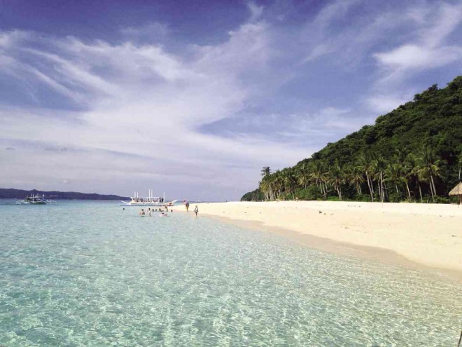 THE PUKA Shell Beach on Boracay Island provides crystal azure waters. YVETTE LEE/CONTRIBUTOR