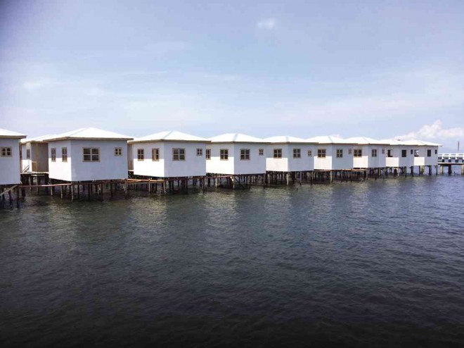 NO MORE makeshift huts and floating shanties. The Zamboanga City government has started turning over white houses on stilts to families displaced by the 2013 terror attack on the city by followers of Moro leader Nur Misuari.JULIE ALIPALA/INQUIRER MINDANAO 