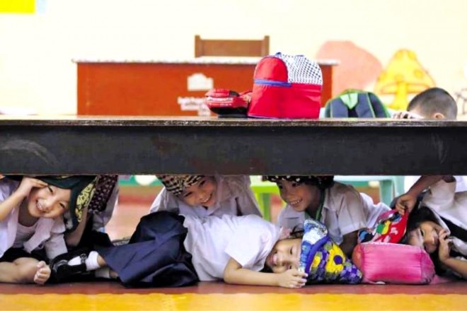 Students of schools participate in the metro manila shake drill to prepare for earthquakes