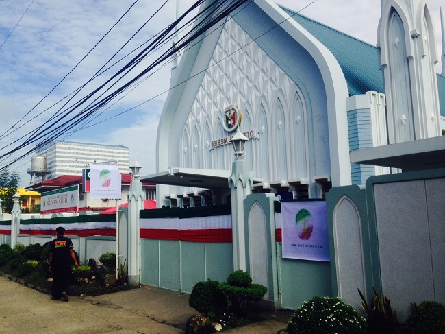  Tapaulins that read "One with EVM" were hang outside the church of the Iglesia ni Cristo in Los Baños Laguna. The number of attendees and cars parked outside the church was unusually big on Sunday,a day before the INC's 101st anniversary. MARICAR CINCO/PHILIPPINE DAILY INQUIRER
