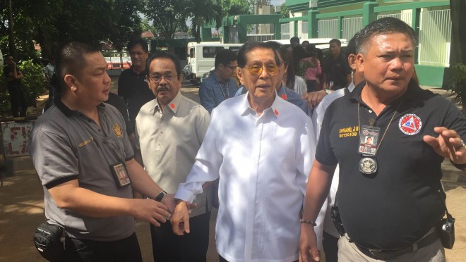 Detained senator Juan Ponce Enrile arrives at Sandiganbayan for pretrial.