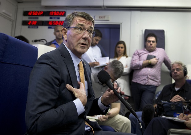 U.S. Defense Secretary Ash Carter speaks to the media on a military aircraft, Sunday, July 19, 2015, en route to Tel Aviv, Israel, from Andrews Air Force Base, MD. Carter is traveling to Israel to talk with officials there as well as Jordan and Saudi Arabia, U.S. allies whose leaders also are worried about the Iran nuclear deal's implications. (AP Photo/Carolyn Kaster, Pool)