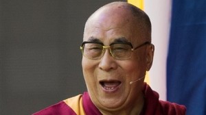 In this June 29, 2015 file photo, exiled Tibetan spiritual leader Dalai Lama delivers a speech at the ESS Stadium in Aldershot, southern England. AP