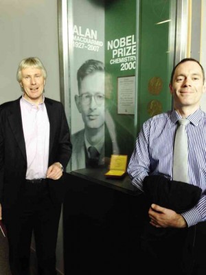 MANAGERS Roger Armstrong and Matthew Eglinton by Victoria’s place of honor for alumnus Alan MacDiarmid, Nobel prize winner for chemistry