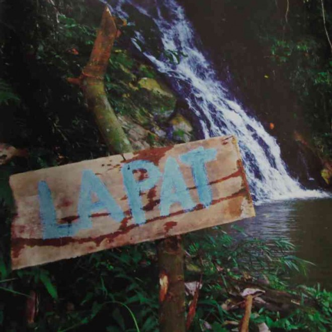 A SIGNAGE indicates that this waterfall in Apayao is under “lapat” and is off limits to community members and visitors. PHOTO FROM THE 2015 BOOK, “VOICES FROM THE CORDILLERAS: GUARDIANS OF THE FOREST, STEWARDS OF THE LAND”