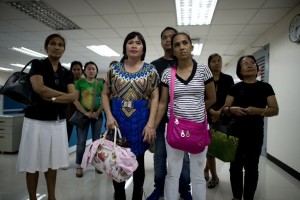 In this photo taken on November 19, 2014 relatives and widows of victims of the Maguindanao Massacre arrive at the National Police Commission (NAPOLCOM).  Long-suffering widows of the Philippines' worst massacre said on July 18, 2015 that they have not forgiven a key suspect in spite of his death, as they repeated cries for justice. Andal Ampatuan Sr, who died on July 17 while battling liver cancer, should have lived to serve time in jail, the widows said. AFP FILE PHOTO