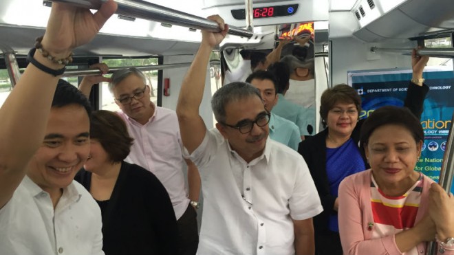 Transportation Secretary Joseph Emilio "Jun" Abaya  (left) tries the hybrid electric road train of the Department of Science and Technology with Science Secretary Mario Montejo (middle) and Senator Cynthia Villar (right). Photo by Nestor Corrales/INQUIRER.net