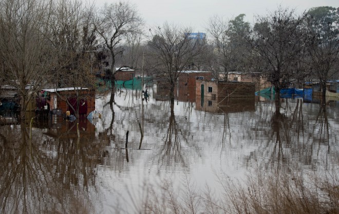 Homes are flooded in Lujan, Argentina, Tuesday, Aug. 11, 2015. AP