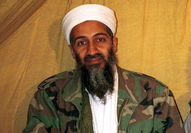 FILE - This undated file photo shows al-Qaida leader Osama bin Laden in Afghanistan. Saudi Arabia's ambassador to the United Kingdom says family members of the late al-Qaida leader were killed in a private jet crash in southern England on Friday, July 31, 2015. (AP Photo/File)