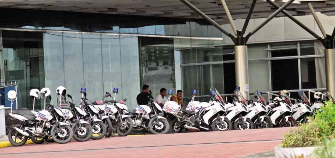 BRAND-NEW police motorcycles for use during the Asia-Pacific Economic Cooperation (Apec) meetings are parked at what remains of the Cebu International Convention Center. JUNJIE MENDOZA/CEBU DAILY NEWS