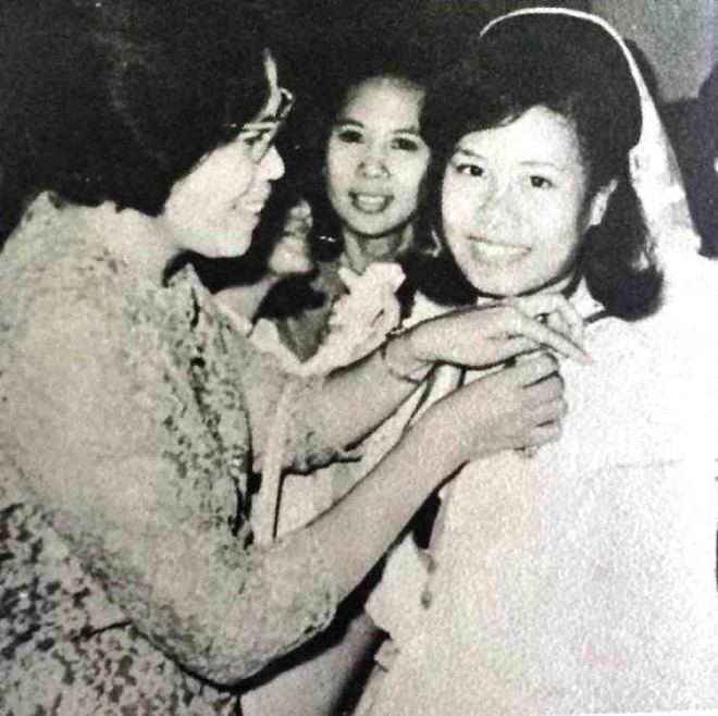 MARIA Concepcion Araneta-Bocala receives first honor award during her high school graduation at Assumption Iloilo in 1967. PHOTO from Assumption Iloilo yearbook Tidings 