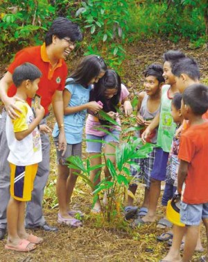 FUTURE GAINS Children are encouraged to plant and promote “kaong,” considering its almost 10-year gestation period, as it secures their future.