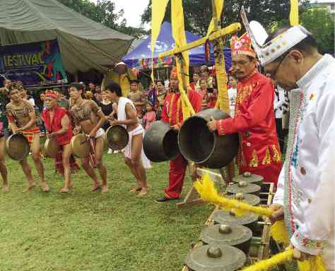 PEACE GONGS In 2014, indigenous Filipino groups of the Cordillera organized a gong festival to promote peace.  They invited Baguio City’s Muslim community, who joined the celebration with their own instruments, the kulintang. VINCENT CABREZA