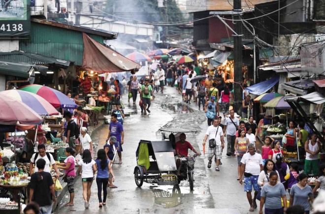 SHAPE UP OR CLOSE SHOP  The present state of Balintawak Market is hardly enticing to shoppers, that’s why it is included among the eight privately owned markets facing closure in Quezon City for being unsanitary and posing fire hazards.   Lyn Rillon