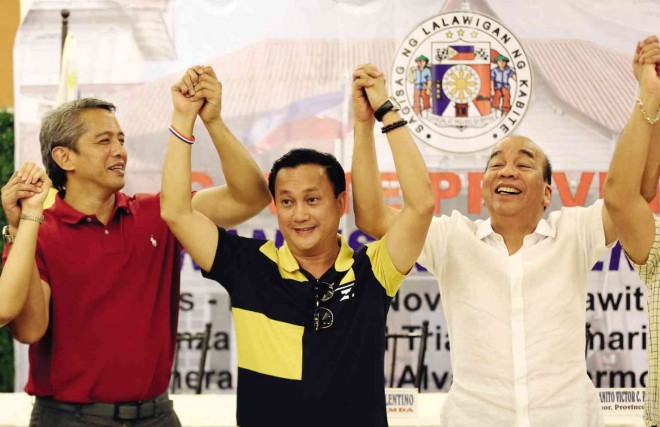 NEXT STOP FOR metro’s TRAFFIC MAN MMDA chair Francis Tolentino (center) has fellow Caviteños like Gov. Jonvic Remulla (left) and Dasmariñas City Rep. Elpidio Barzaga endorsing his senatorial bid  on Tuesday.  MARIANNE BERMUDEZ