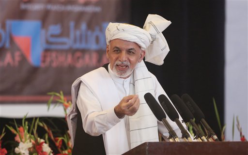 Afghanistan's President Ashraf Ghani speaks to religious leaders during an anti-corruption conference at Amani high school in Kabul, Afghanistan, Tuesday, Sept. 1, 2015. AP