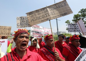 September 15, 2015 LUMADS storm Mining conference in Solaire-Lumads joined by militant troop outside the annual mining conference organized by the Chamber of Mines in the Philippines in Pasay City . The protesters are demanding justice for the killing of lumads in Mindanao by a suspected para-military group. INQUIRER/ MARIANNE BERMUDEZ