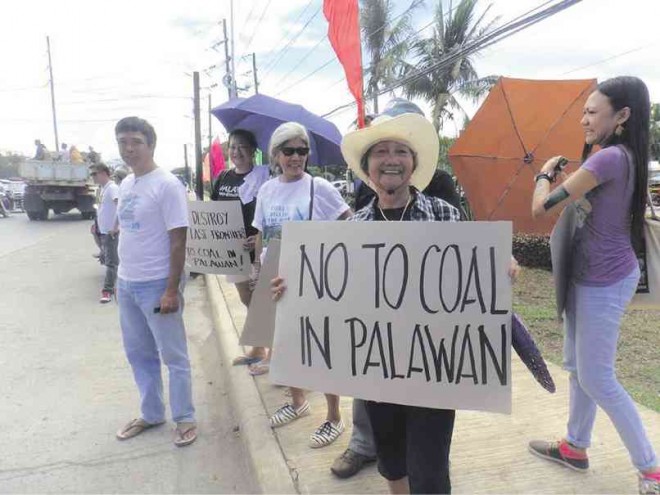 ENVIRONMENTALISTS protest the planned construction of a coal-fired facility in Palawan province.  NO TO COAL CAMPAIGN/CONTRIBUTOR 