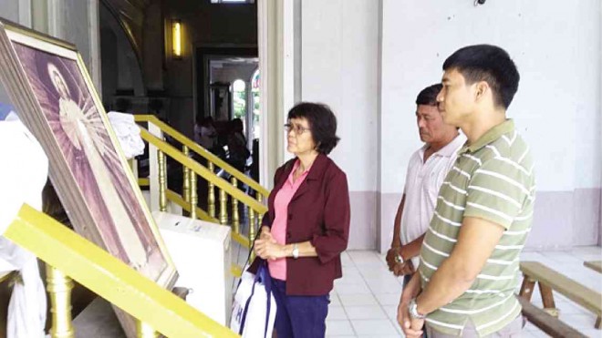 DEXTER Balane, a former soldier, visits St. Joseph Cathedral in Tagbilaran City, Bohol province, with his father, Diosario, and mother, Luz (not shown in photo), hoping to put an end to what the Balane family said is the continued wrongful accusation against Dexter.  LEO UTDOHAN 