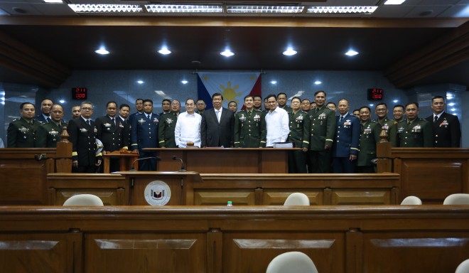 General Hernando DCA Iriberri, Chief of Staff AFP, stands at the center of 104 other military officers after the Senate confirmed their new ranks this morning (September 9).  Photo by Ssg Amable Milay Jr. PAF (PAO AFP)