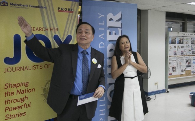 ANSWERED PRAYER As Metrobank Foundation president Chito Sobrepeña prepares to make an important annoucement at the INQUIRER office on Wednesday, reporter Nancy Carvajal seems to be praying for good news. A few minutes later, she got it. Carvajal was named Metrobank Foundation’s Journalist of the Year, along with Marites Vitug of Rappler and Howie Severino of GMANetwork. In June this year, Carvajal was also named Journalist of the Year by the Society of Publishers in Asia, for her series on the pork barrel scam.