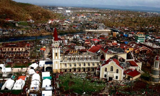 AFTER THE STORM Palo, Leyte province, lies in ruins in the aftermath of Supertyphoon “Yolanda.” The Commission on Audit says the Department of SocialWelfare and Development was a failure in disaster relief for delayed delivery of services and distribution of donations in cash and in kind. INQUIRER PHOTO
