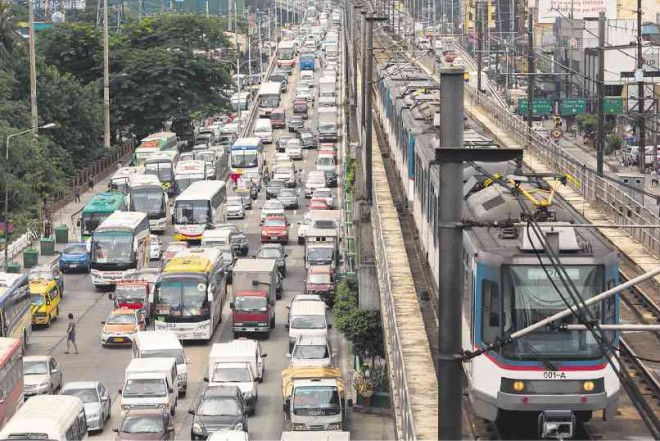 WILL motorists on Edsa behave with the return of armed traffic enforcers? The PNP-HPG hopes so.   Inquirer file photo