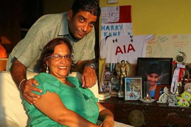 Jaidipsinh Jhala and wife Karen with photos, trophies and other items belonging to daughter Sonia, one of seven pupils who died. 