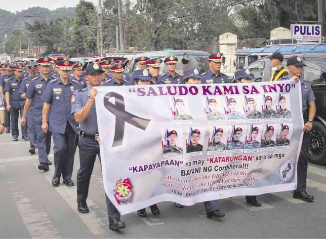 CORDILLERA policemen join a march honoring the fallen Special Action Force members from the region early this year when their remains arrived in La Trinidad, Benguet province, the base of the regional police command. RICHARD BALONGLONG/INQUIRER NORTHERN LUZON