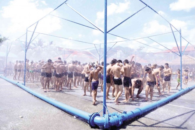 WITH hundreds of people sharing a shower, Los Baños town in Laguna province attempts to steal the world title for the most number of people bathing simultaneously in a public place. The shower festival was held on Sept. 19 as the town celebrated its 400th founding anniversary. ALBERT LARESMA/CONTRIBUTOR