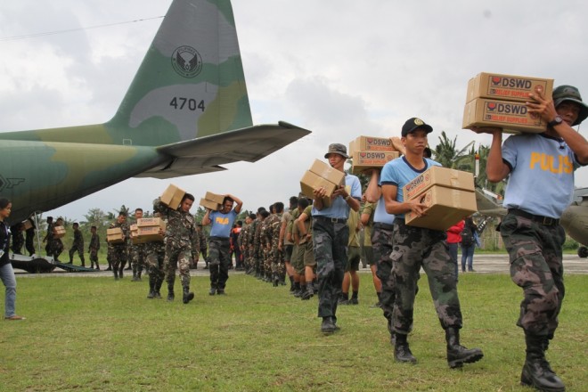 Soldiers continue to unload relief goods for typhoon Lando victims in Aurora province. CONTRIBUTED PHOTO/Philippine Air Force