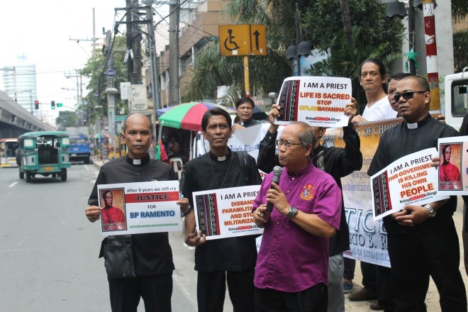 Aglipayan Church’s Obispo Maximo Ephraim Fajutagana speaks during a rally attended by church people and human rights’ workers on Saturday along Taft Avenue, Manila.