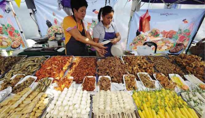 QUICK MEALS Native delicacies from northern and central Luzon are featured in this year’s “Big Bite!” food festival in Angeles City.      EV ESPIRITU
