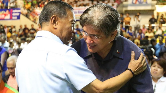 Vice President Jejomar Binay with Sen. Gringo Honasan during the official launch of the United Nationalist Alliance (UNA), touted to be the main opposition party in the 2016 elections, at the Makati Coliseum, wednesday. INQUIRER/ MARIANNE BERMUDEZ