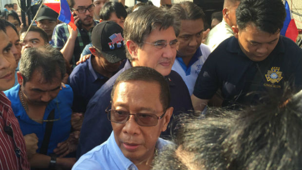 Vice President Jejomar Binay and Senator Gringo Honasan arrive at the Commission on Elections to file their certificates of candidacy for president and vice president. MARC JAYSON CAYABYAB/INQUIRER.net
