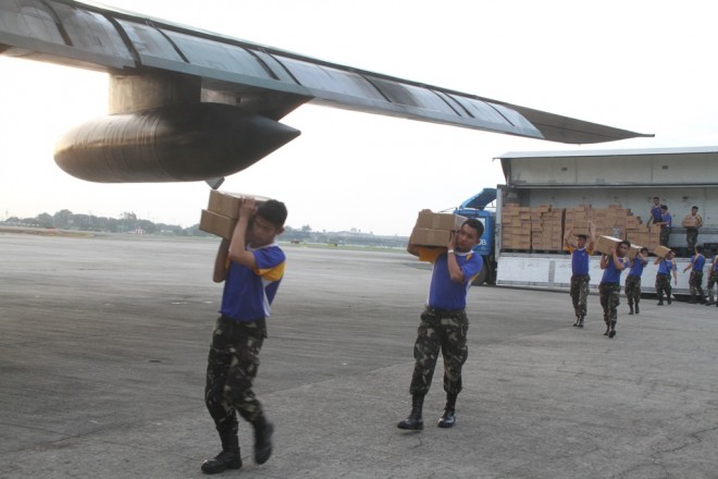 Soldiers unloading more relief goods for typhoon victims in Aurora province. CONTRIBUTED PHOTO/Philippine Air Force