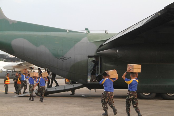 Loading the C-130 with relief goods, this photo was taken earlier on Wednesday before the contingent proceeded to typhoon Lando-stricken province of Aurora. CONTRIBUTED PHOTO/Philippine Air Force