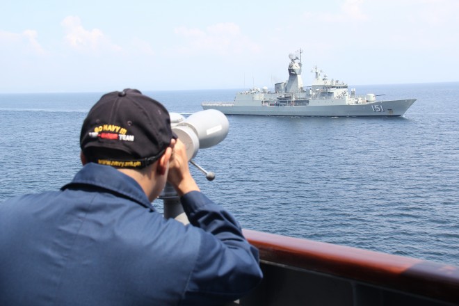 Australian Navy ships hold passing exercise with Philippine warship BRP Ramon Alcaraz in Subic, Zambales on Sunday, Oct. 11. The Australian ships were on a five-day goodwill visit to the Philippines. / PHILIPPINE NAVY