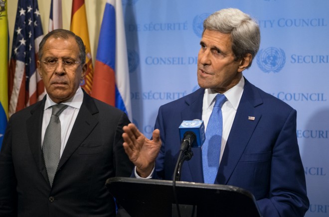 U.S. Secretary of State John Kerry, right, speaks next to Russia's Foreign Minister Sergey Lavrov during a news conference at the U.N., Wednesday, Sept. 30, 2015. (AP Photo/Craig Ruttle)