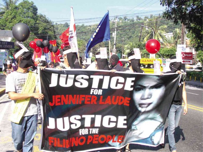 ON THE first death anniversary of transgender woman Jeffrey “Jennifer” Laude, supporters and friends of the Laude family march in Olongapo City carrying banners calling for justice through the conviction of US Marine Pfc. Joseph Scott Pemberton, who is facing a murder charge for the slaying of Laude. 