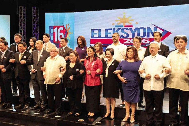 PARTNERS FOR CLEAN ELECTIONS  Top executives of  the Inquirer, GMA 7 and other partners link arms after signing the memorandum of understanding for clean elections in 2016.   From left front row:  Mike C. Enriquez;  Napoleon Nazareno, PLDT/Smart president and CEO; Felipe L. Gozon, GMA Network chair and CEO; Marissa Flores; Alexandra Prieto-Romualdez, Inquirer  president and CEO; Henrietta de Villa, PPCRV chair; Jessica Soho; Alfredo E. Pascual, UP president; Jaime Hofileña, Ateneo de Manila University VP for social development. LEO M. SABANGAN II 