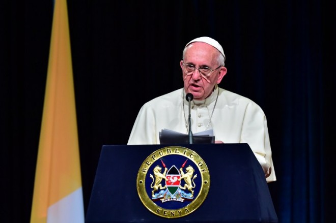 Pope Francis delivers a speech at the State House of Nairobi on November 25, 2015. Pope Francis said the world was facing a "grave environmental crisis" as he arrived in Kenya on Wednesday on a landmark Africa trip just days before a crucial UN summit aimed at curbing climate change. He also warned of the need to tackle poverty as a key driver of conflict and violence as he kicked off a landmark Africa trip fraught with security concerns and urged Kenya's leaders to work with "transparency" to ensure a fair distribution of national resources as criticism grows over runaway graft in this east African country. AFP PHOTO / GIUSEPPE CACACE / AFP / GIUSEPPE CACACE